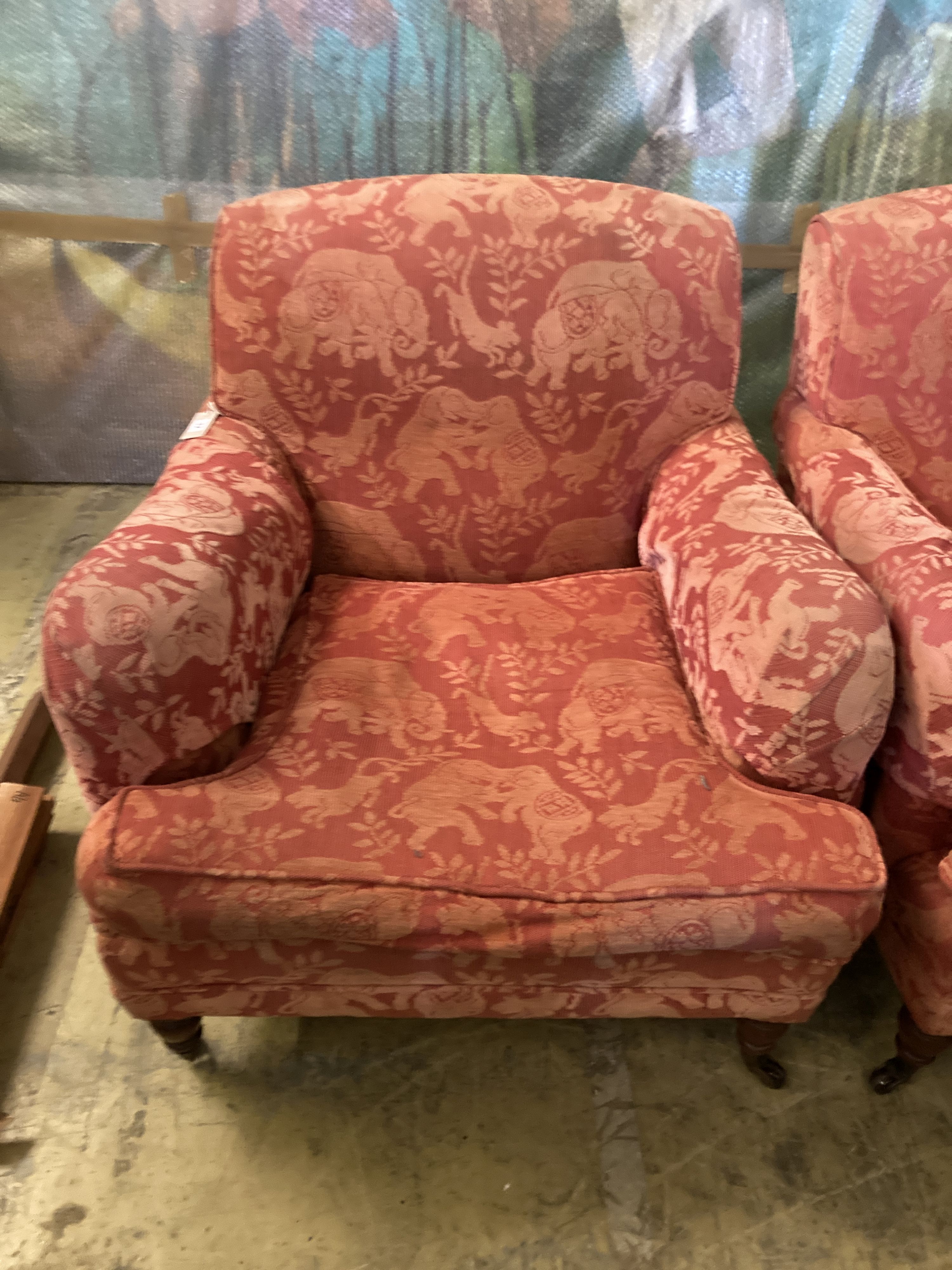 A pair of late Victorian style upholstered lounge armchairs, width 88cm, depth 98cm, height 83cm